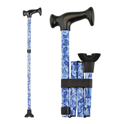 The Nova Folding Walking Cane with Wood Grip Handle & Quad Tip features a blue and white floral pattern, ergonomic wood handle, quad-tip base, and folds compactly for easy travel. Shown fully extended and folded for portability.