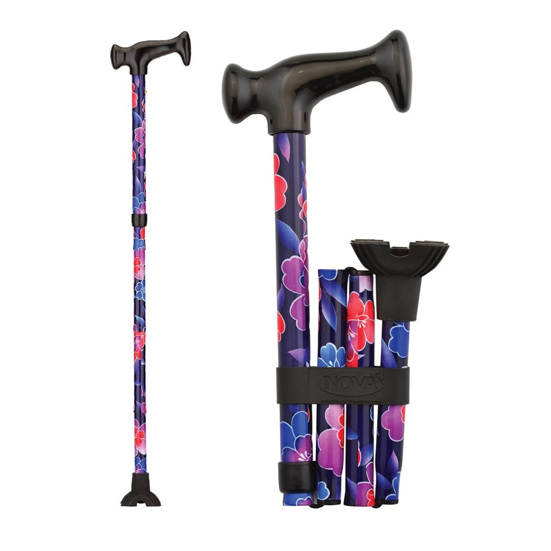 The Nova Folding Walking Cane with Wood Grip Handle & Quad Tip features a floral pattern, folds for compact storage, and has an adjustable design with a comfortable black ergonomic handle and rubber quad tip. Shown fully extended and folded.