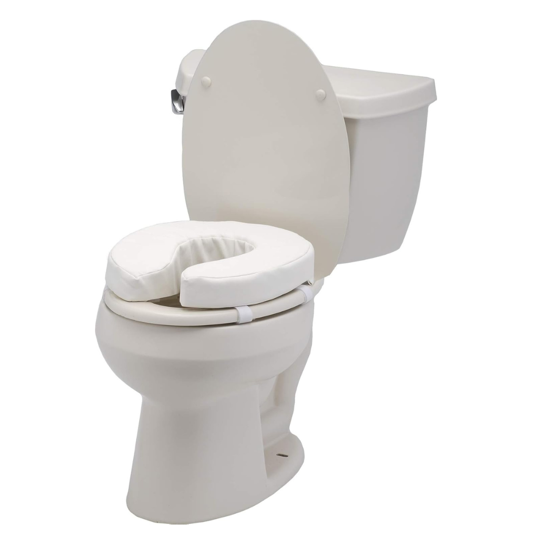 The Nova Medical Toilet Seat Cushion and Riser is a standard white toilet riser with a padded seat for extra comfort and support, securely attached to the bowl with Velcro straps to keep it firmly in place.
