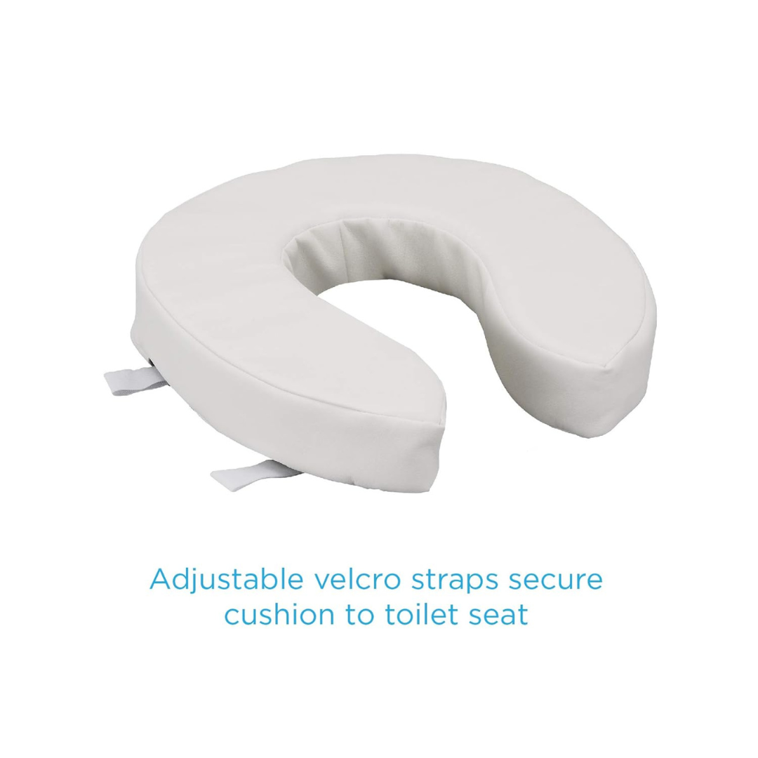 The Nova Medical Toilet Seat Cushion and Riser is a white, U-shaped foam cushion with adjustable Velcro straps for easy securing and added seat elevation. Text: “Adjustable Velcro straps secure cushion to toilet seat.”.