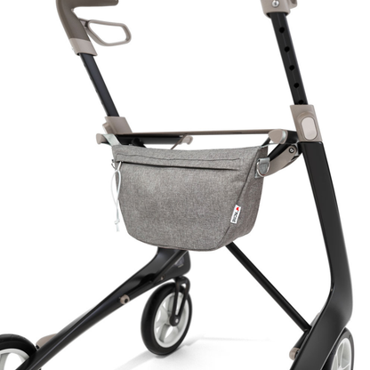 Enhance your ByAcre Carbon Fiber Rollator with this modern black and gray Organizer Bag, featuring a zippered pouch for convenient storage and improved mobility—ideal for those seeking functional rollator accessories.