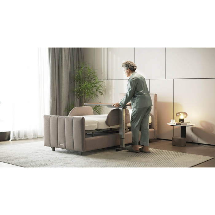 An older adult adjusts a support bar on the Starsleep Orin Rotating Full Electric Lift Assist Bed with Heat & Massage in a modern bedroom with multifunctional features like a potted plant, side table lamp, and light-colored walls and curtains that blend style with practical comfort.