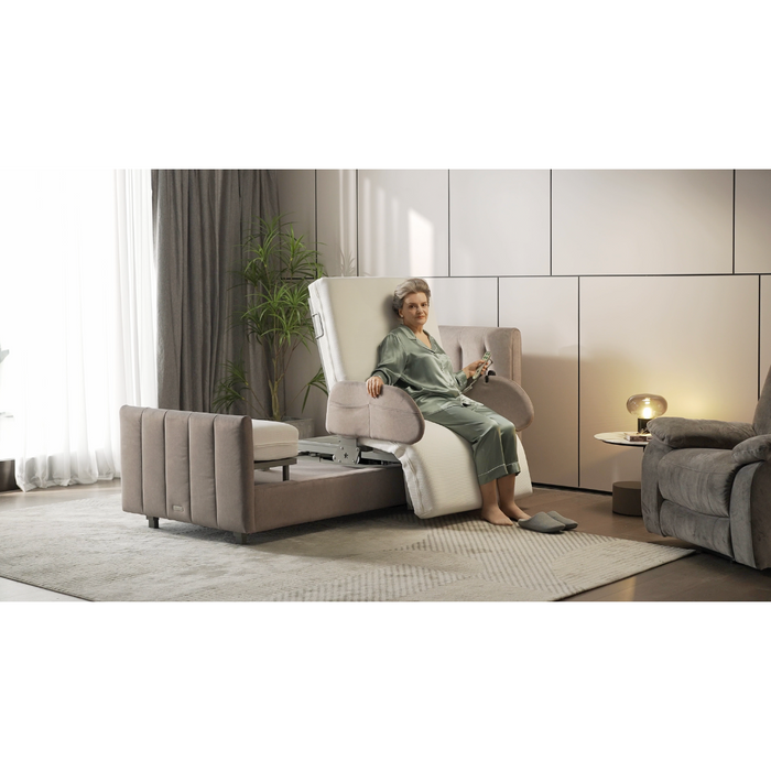 An elderly woman relaxes in a Starsleep Orin Rotating Full Electric Lift Assist Bed with Heat & Massage, remote in hand, set in a stylish living room adorned with a plant, curtain, and lamp-topped table, embracing comfort and multifunctional modern design.