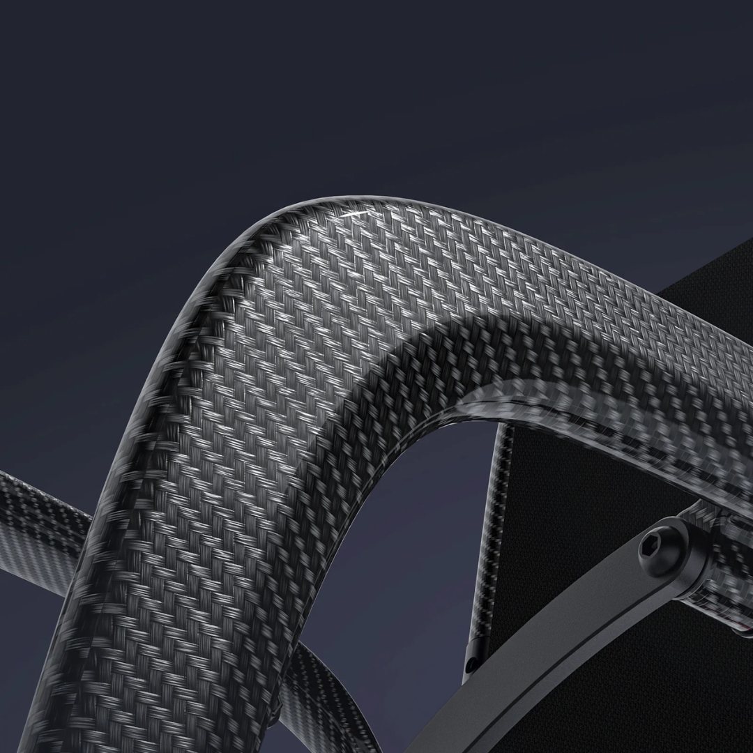 Close-up of the Paiseec Q5 Carbon Fiber Electric Wheelchair, highlighting its sleek, curved frame and signature carbon fiber woven pattern, set against a dark gradient background.