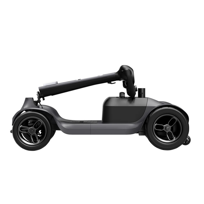 The Paiseec S1 Portable Electric Mobility Scooter features a sleek, minimalist design with a durable frame and large rear wheels, ideal for traveling up to 25 miles on various terrains. The black, compact scooter is foldable and designed for modern aesthetics and extended use.