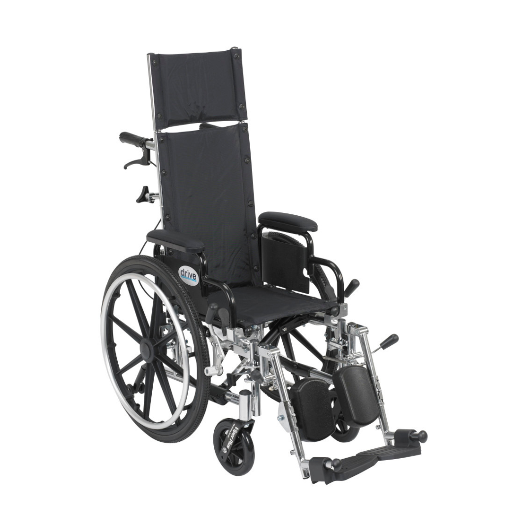 The Drive Pediatric Viper Plus Hydraulic Reclining Wheelchair features a black and silver finish, chrome steel frame, elevated leg rests, padded armrests, large rear wheels, small front wheels, and a high reclining backrest.