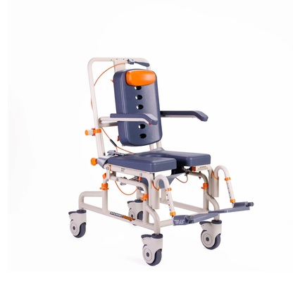 The ShowerBuddy Petite Buddy P1 Child & Small User Kit, featuring a padded blue seat and backrest with orange accents, armrests, adjustable footrests, and four wheels for mobility, is shown against a white background.