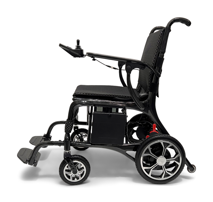 The ComfyGo Phoenix Carbon Fiber Electric Wheelchair, shown side-on against a plain background, features a joystick control on the armrest, black padded seat and backrest, sturdy carbon fiber frame, and is equipped with small front wheels and larger rear wheels for an innovative design.