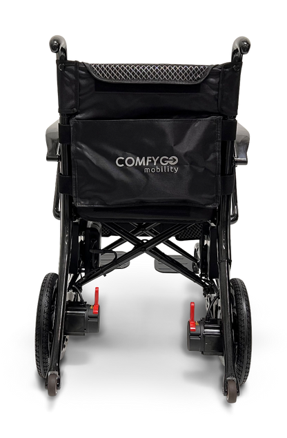 Rear view of the stylish ComfyGo Phoenix Carbon Fiber Electric Wheelchair. The foldable black chair features a mesh backrest, red lever locks on the rear wheels, and the brand name printed on the back for style and convenience on the move.