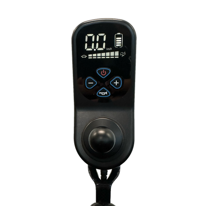 Close-up of a ComfyGo Phoenix Carbon Fiber Electric Wheelchair remote with a digital display showing 0 km/h and a full battery. It includes power and speed control buttons, plus joystick input, on a black background.