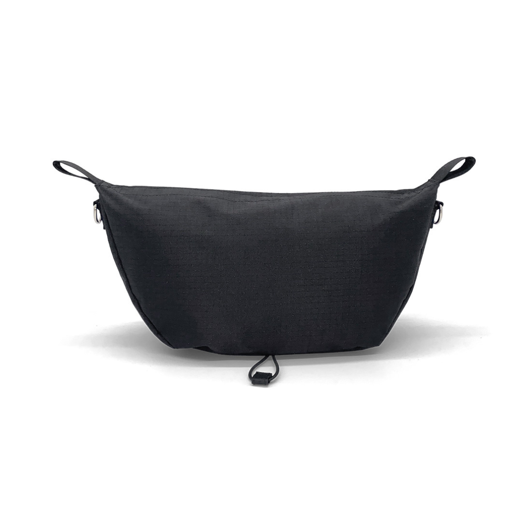 A minimalist black Pocket Bag For ByAcre Carbon Fiber Rollators features a simple rectangular shape, two end loops, and a bottom center strap—an ideal mobility accessory for rollators—shown against a white background.