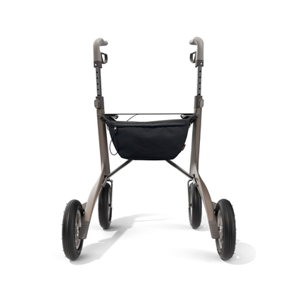 The Pocket Bag for ByAcre Carbon Fiber Rollators, shown from the front against a white background, is a black accessory designed for four-wheeled mobility walkers with large tires and adjustable handles.