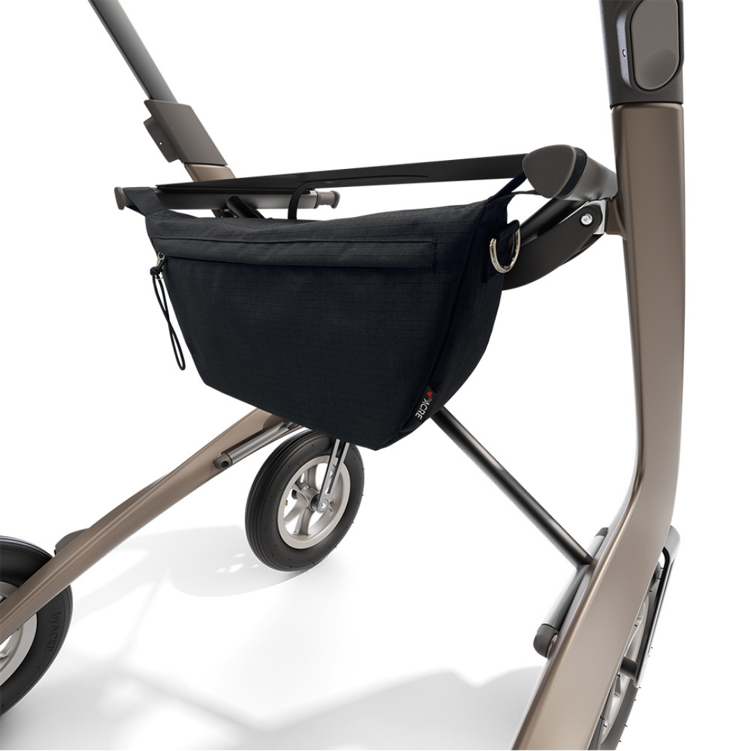 A close-up of a modern stroller frame with a black Pocket Bag For ByAcre Carbon Fiber Rollators attached beneath the seat, featuring a zipper and metal ring—a stylish accessory—shown on a white background.