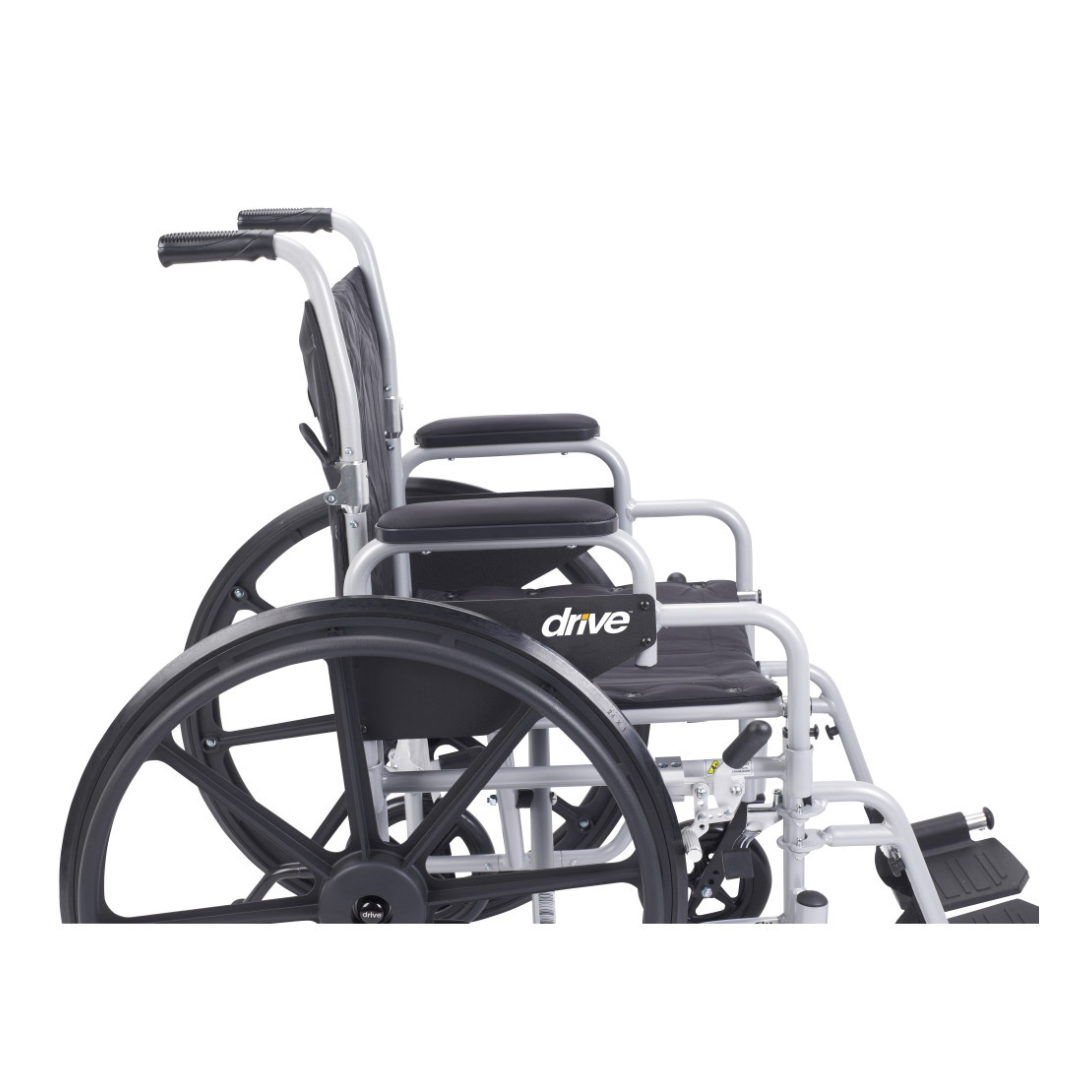 Side view of the Drive Poly-Fly Lightweight Wheelchair/Transport Chair Combo with large rear wheels, footrests, black seat and armrests. The light-colored frame displays "drive" branding on the side.