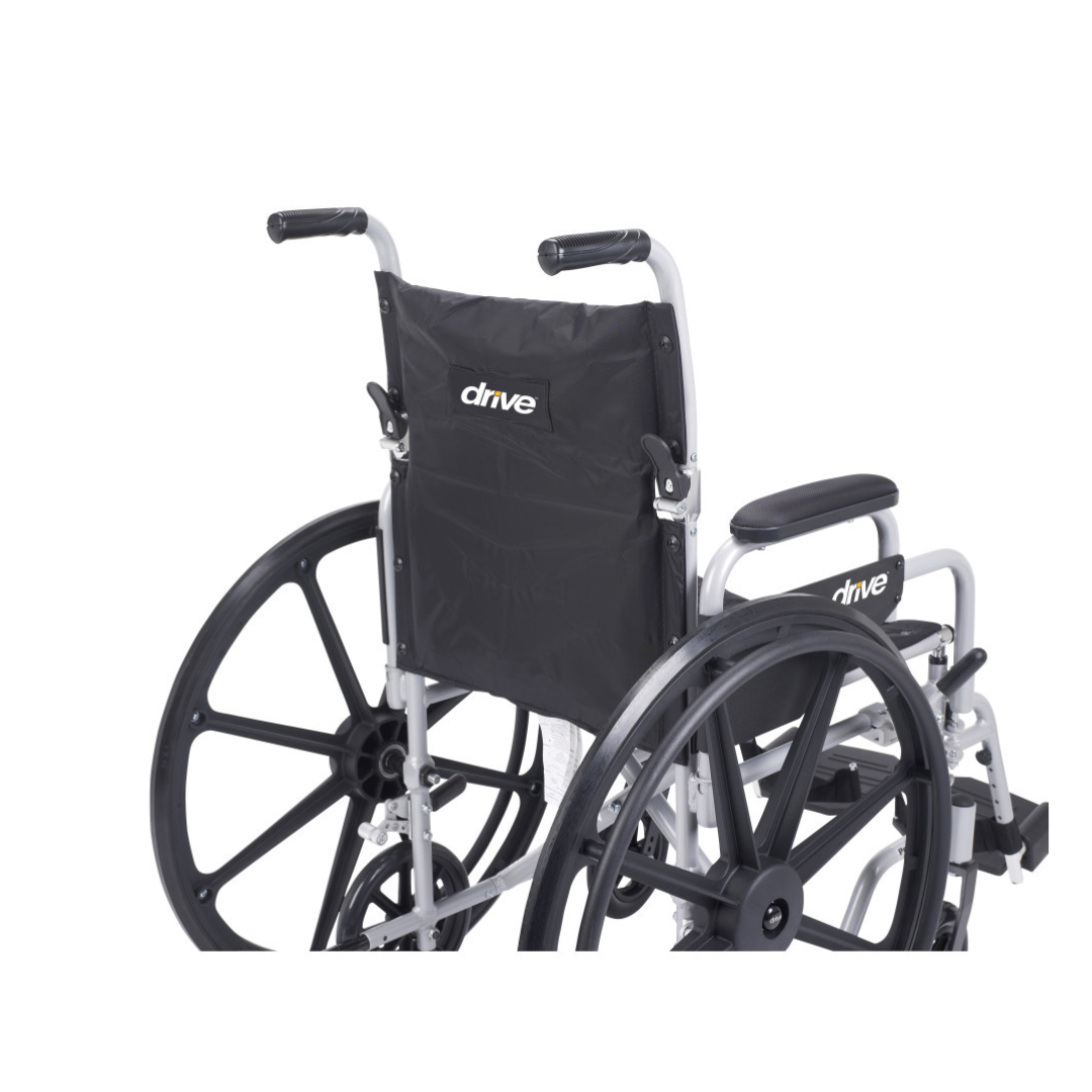 A rear view of the Drive Poly-Fly Lightweight Wheelchair/Transport Chair Combo shows large black wheels, black armrests, a black backrest with the white drive logo, and a sturdy metallic frame; the wheelchair is unoccupied.