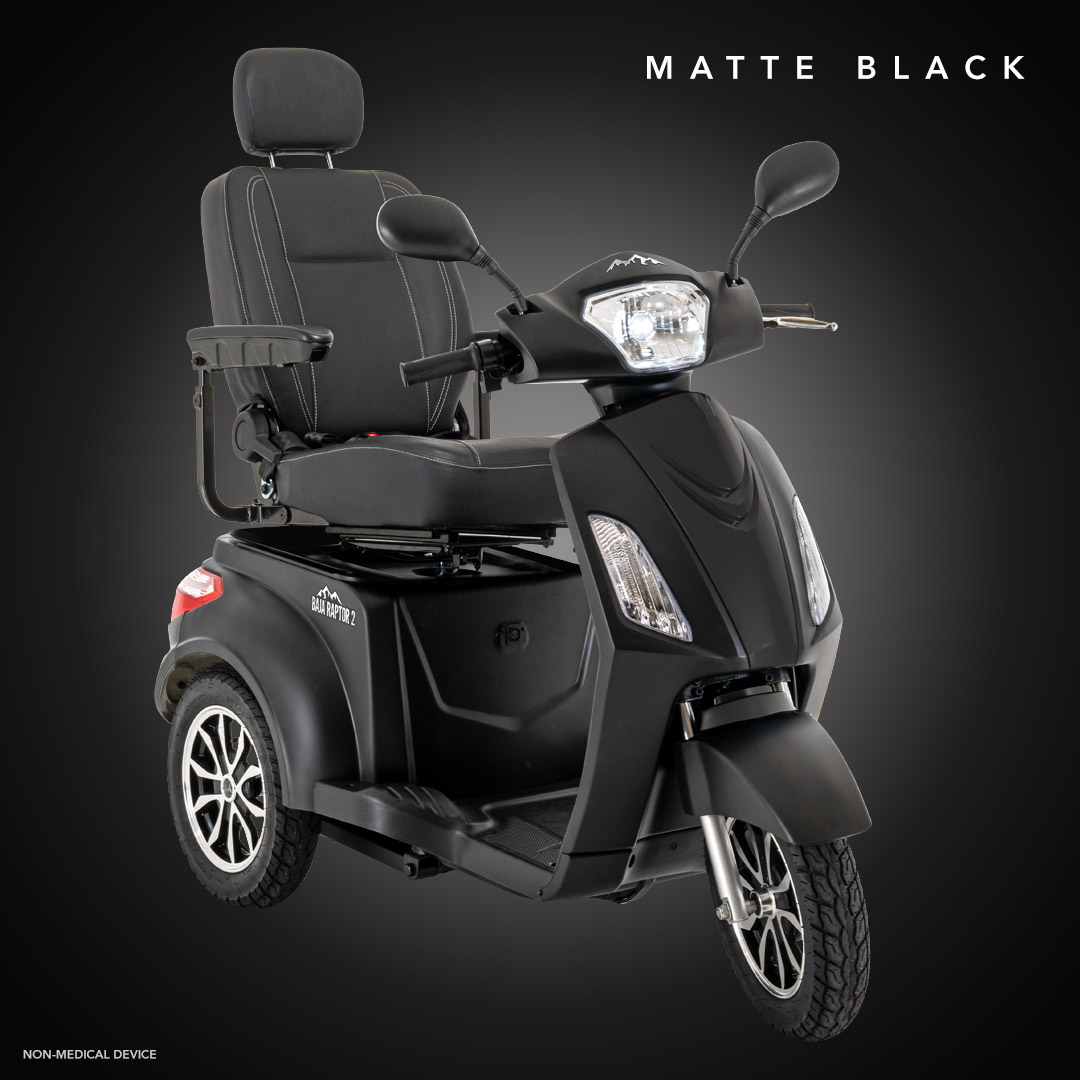 A Pride Baja® Raptor® 2 Bariatric 3-Wheel Scooter in matte black, featuring LED lights, padded seat and backrest, armrests, and rearview mirrors, is pictured on a dark background with MATTE BLACK at the top right.
