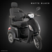A Pride Baja® Raptor® 2 Bariatric 3-Wheel Scooter in matte black, featuring LED lights, padded seat and backrest, armrests, and rearview mirrors, is pictured on a dark background with MATTE BLACK at the top right.