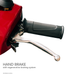 Close-up of a black rubber hand brake lever on a red handlebar, labeled HAND BRAKE with regenerative braking—an essential feature for outdoor mobility on the Pride Baja® Raptor® 2 Bariatric 3-Wheel Scooter.