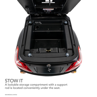 A lockable storage compartment with a support rod is located under the seat of the Pride Baja® Raptor® 2 Bariatric 3-Wheel Scooter, offering convenient stowage with an open lid held up securely. Text: STOW IT.