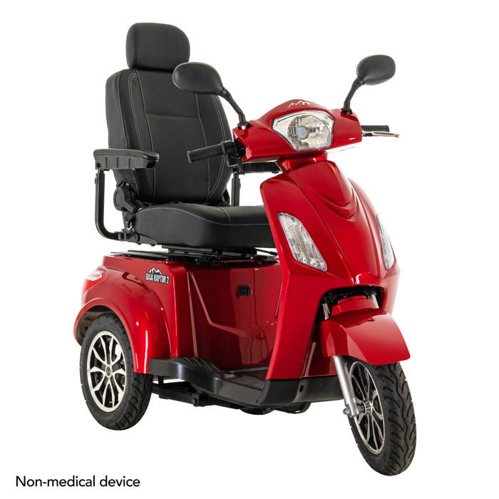 The Pride Baja® Raptor® 2 Bariatric 3-Wheel Scooter features a red finish, high back seat, armrests, black trim, large outdoor tires, handlebars, LED lighting, and a sturdy build. Text in corner: Non-medical device.