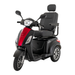 The Pride Baja® Raptor® 2 Bariatric 3-Wheel Scooter features a black and red body, large cushioned seat with armrests and headrest, side mirrors, LED lighting, and front headlight for comfortable outdoor mobility.