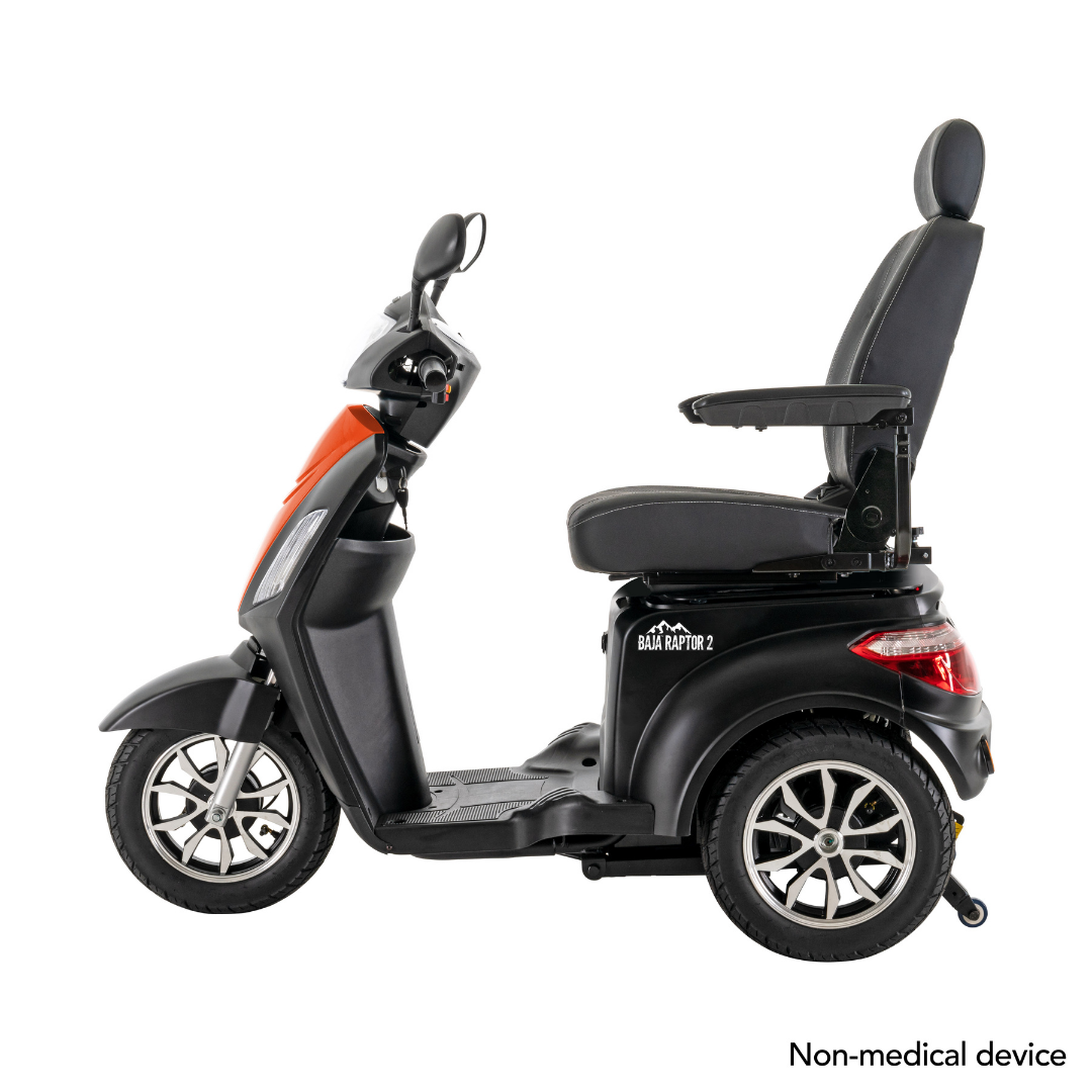 A black and orange Pride Baja® Raptor® 2 Bariatric 3-Wheel Scooter with full suspension, high back seat, and armrests is shown from the side on a white background. The phrase Non-medical device appears in the bottom right corner.