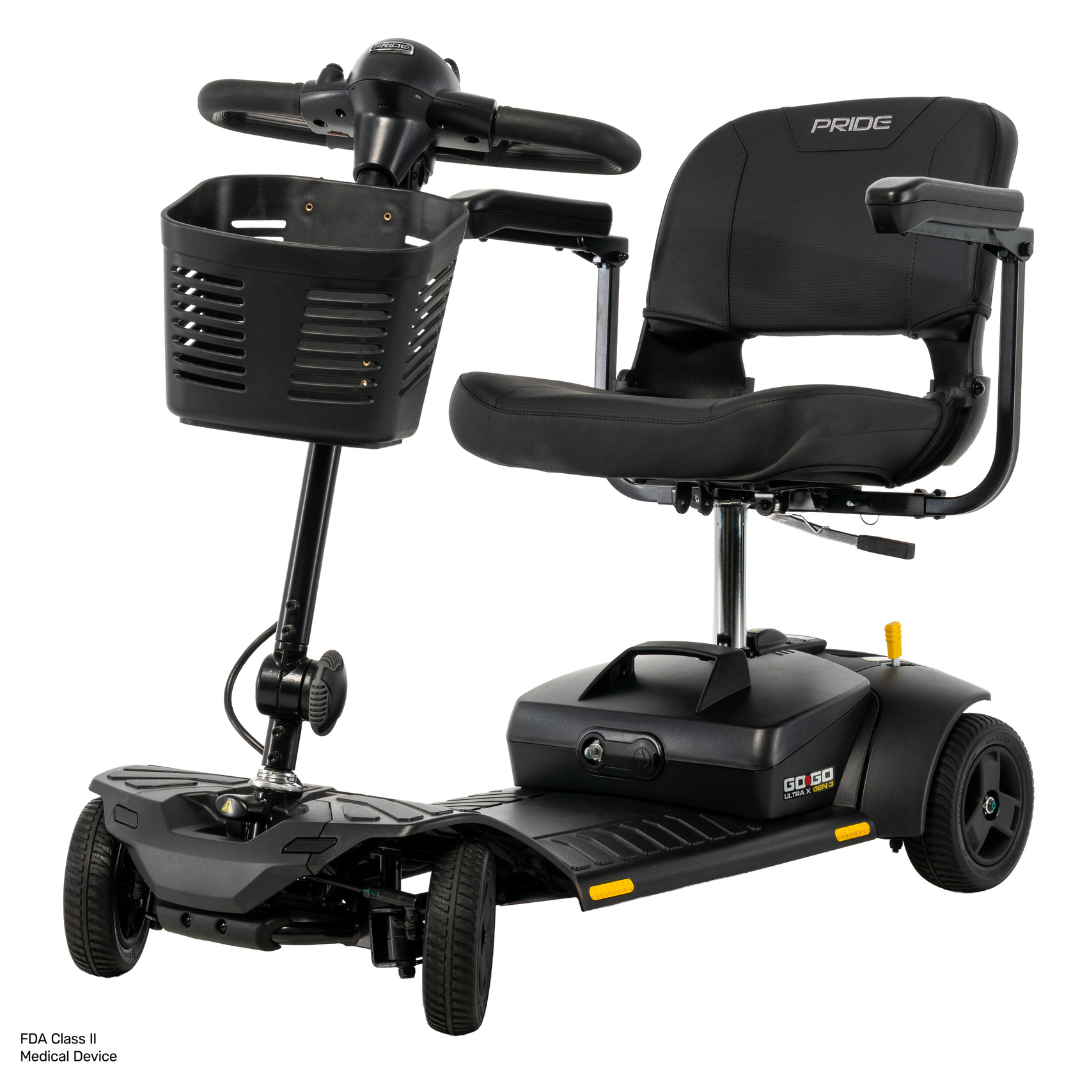 A black Pride Go Go® Ultra X Gen 3 portable mobility scooter featuring a comfortable seat with armrests, three wheels, a mesh front basket, and the Pride logo on the seat back. This mobility scooter is built for easy travel and enhanced accessibility.