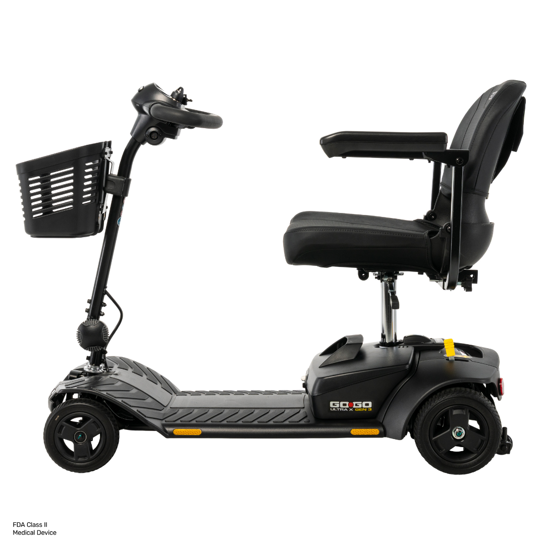 A side view of the black Pride Go Go® Ultra X Gen 3 Portable Mobility Scooter showcases its three-wheel design, seat with armrests, front basket, and control handles against a plain white background. This scooter is engineered for convenient portability and comfortable mobility.