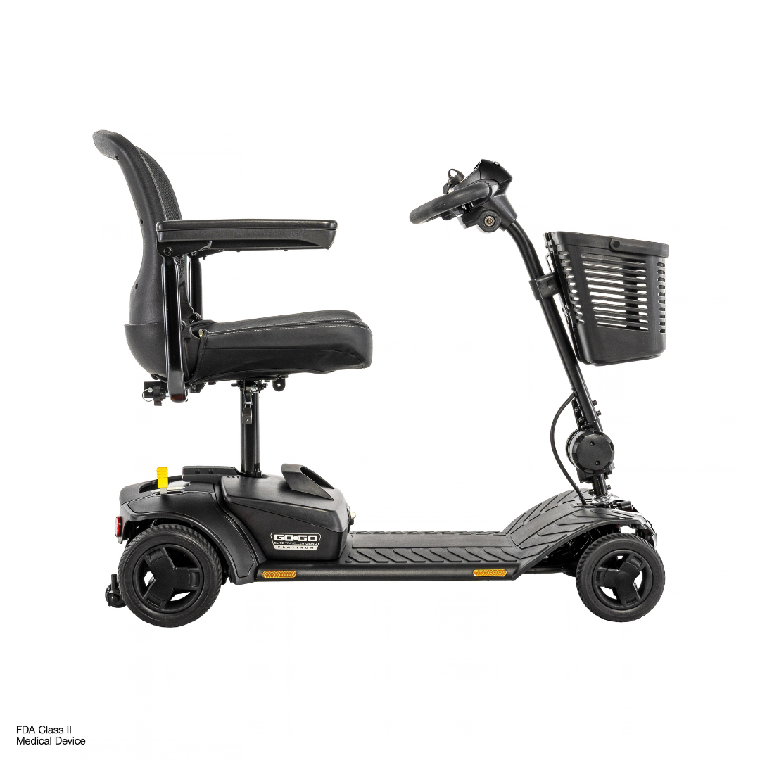 Black four-wheeled Pride Go Go® Elite Traveller Gen 3 Platinum portable mobility scooter with a padded seat, armrests, and a front storage basket.