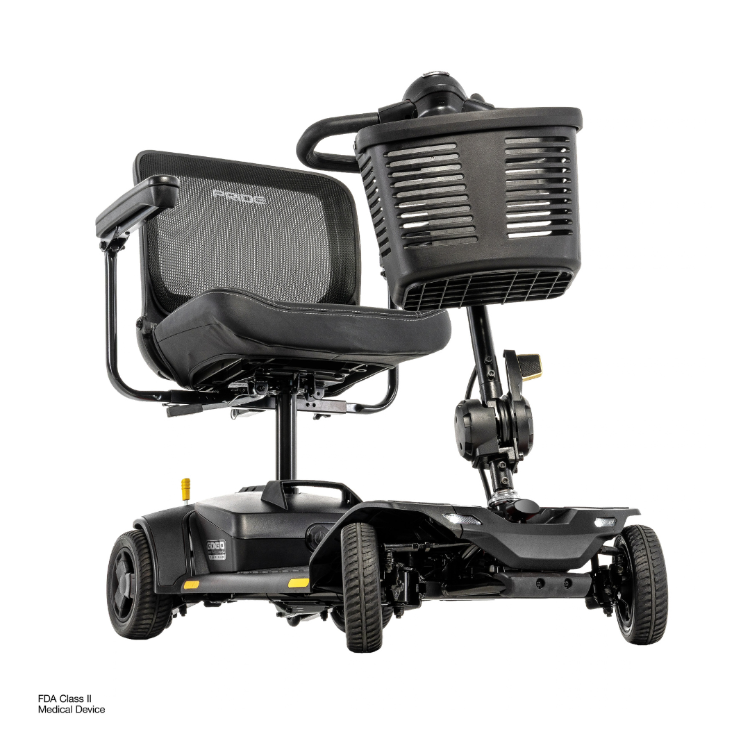 The Pride Go Go® Elite Traveller Gen 3 Platinum Portable Scooter is a four-wheeled mobility scooter featuring a mesh back seat and a front storage basket.