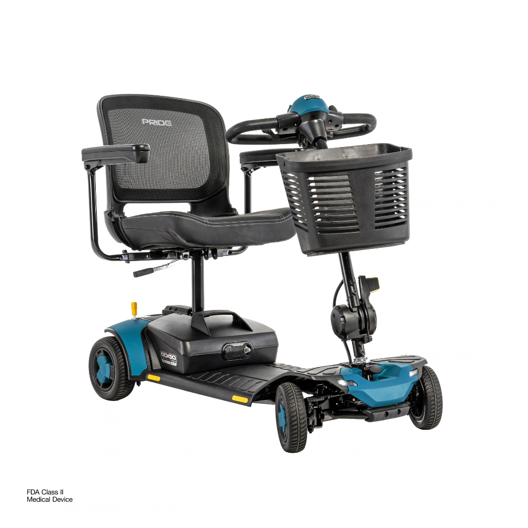 The Pride Go Go® Elite Traveller Gen 3 Platinum Portable Scooter features four wheels, a black mesh seat, and a front-mounted storage basket, with accessible specifications and downloads.