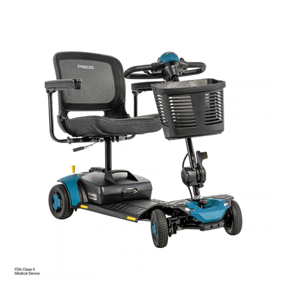 The Pride Go Go® Elite Traveller Gen 3 Platinum Portable Scooter features four wheels, a black mesh seat, and a front-mounted storage basket, with accessible specifications and downloads.