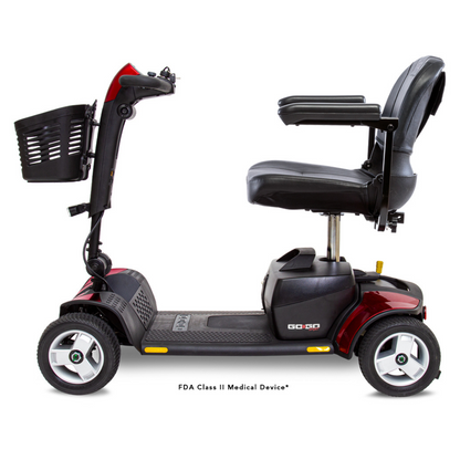 Side view of the Pride Go Go® Sport 4-Wheel Scooter, in red and black, with four wheels, a padded seat with armrests, a control handle, and a front basket. This FDA Class II Medical Device offers feather-touch disassembly for easy transport.