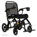 The Pride Mobility Jazzy® Ultra Light Portable Electric Wheelchair is ideal for travel with its mesh backrest, padded seat, joystick control, foldable carbon fiber frame, armrests, and footrest. Designed for easy mobility, this ultra-light wheelchair ensures comfort and convenience on the go.