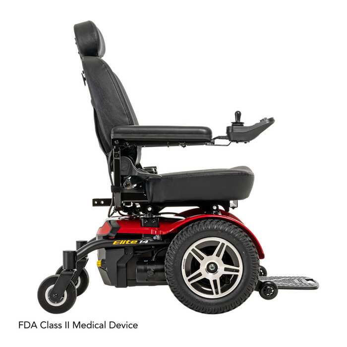 Side view of the Pride Jazzy® Elite 14 Powerchair in red and black with 14” knobby tires for traction. Includes cushioned seat, backrest, armrest controls, footrest, large rear wheels, and is FDA Class II approved.