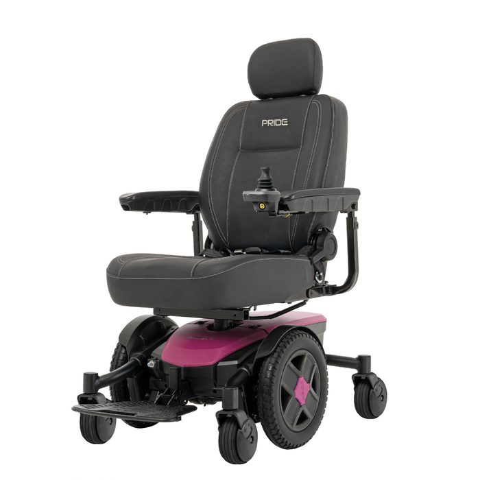 The Pride Mobility Jazzy® EVO 613 Powerchair with ATX Suspension has a black padded seat, magenta base, four wheels for mobility, Mid-Wheel 6® Technology, right-arm joystick control, and Pride embroidered on its headrest.