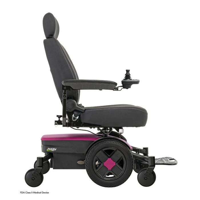 Side view of the Pride Mobility Jazzy® EVO 613 Powerchair with ATX Suspension, featuring a black seat, backrest, armrests, pink base, right-side joystick control, footrest, four wheels, and advanced Mid-Wheel 6® Technology for superior maneuverability.