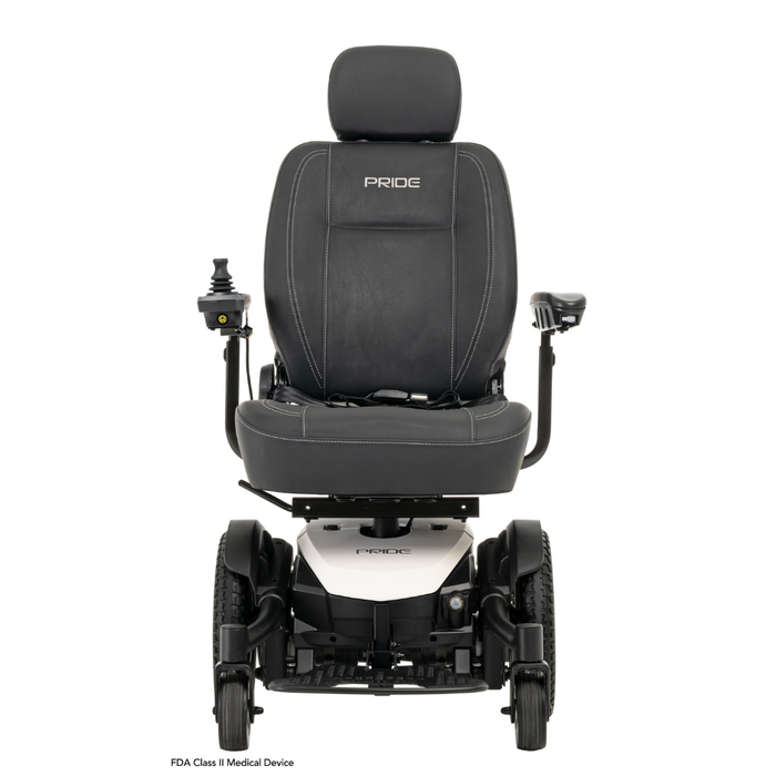A black Pride Mobility Jazzy® EVO 613 Powerchair with ATX Suspension featuring armrests, cushioned seat and back, head support, left-arm joystick control, and Mid-Wheel 6® Technology. Pride branding is on the headrest and under the seat.