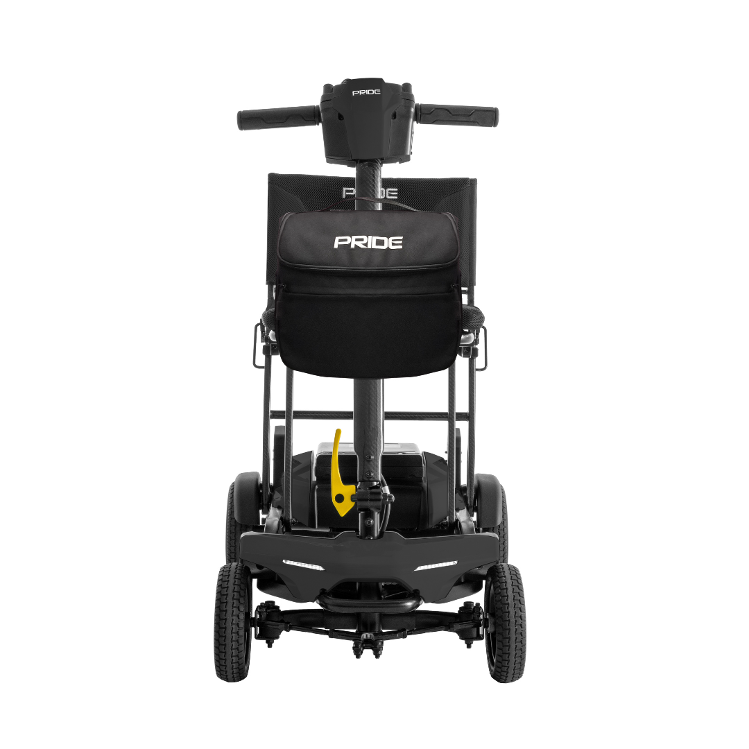 Rear view of the Go Go® Super Portable Mobility Scooter by Pride, featuring a black seat and backrest. It includes four small wheels, an airline-approved battery, and a yellow safety latch for secure travel. The brand Pride is visible on the backrest and steering column.