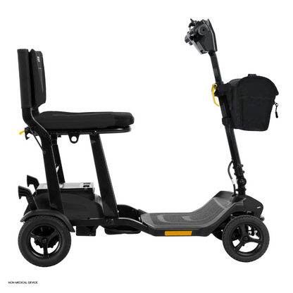 The Pride Mobility Go Go® Super Portable Mobility Scooter features a black seat, armrests, backrest, sturdy floorboard and handlebars. It includes a small bag on the tiller, has four wheels, and comes with an airline-approved battery for convenient personal transportation.