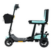Side view of a Pride Mobility Go Go® Super Portable Scooter in teal and black, featuring three wheels, a cushioned seat, and a handlebar-attached black bag. Its lightweight with an airline-approved battery, sturdy frame, and footrest platform.