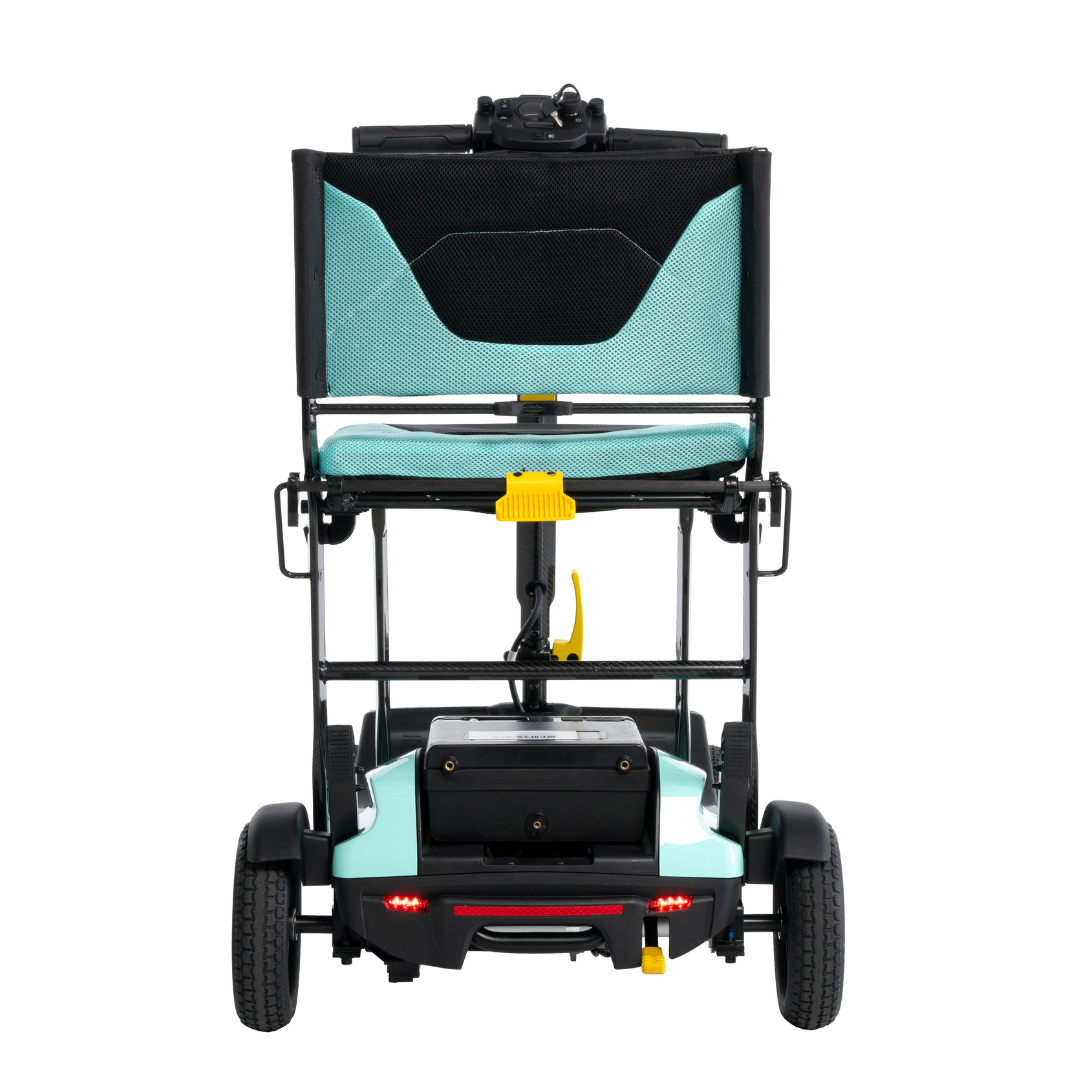 Rear view of the Pride Mobility Go Go® Super Portable Mobility Scooter, a teal and black lightweight three-wheeled scooter with a mesh backrest and airline-approved battery compartment at the base.