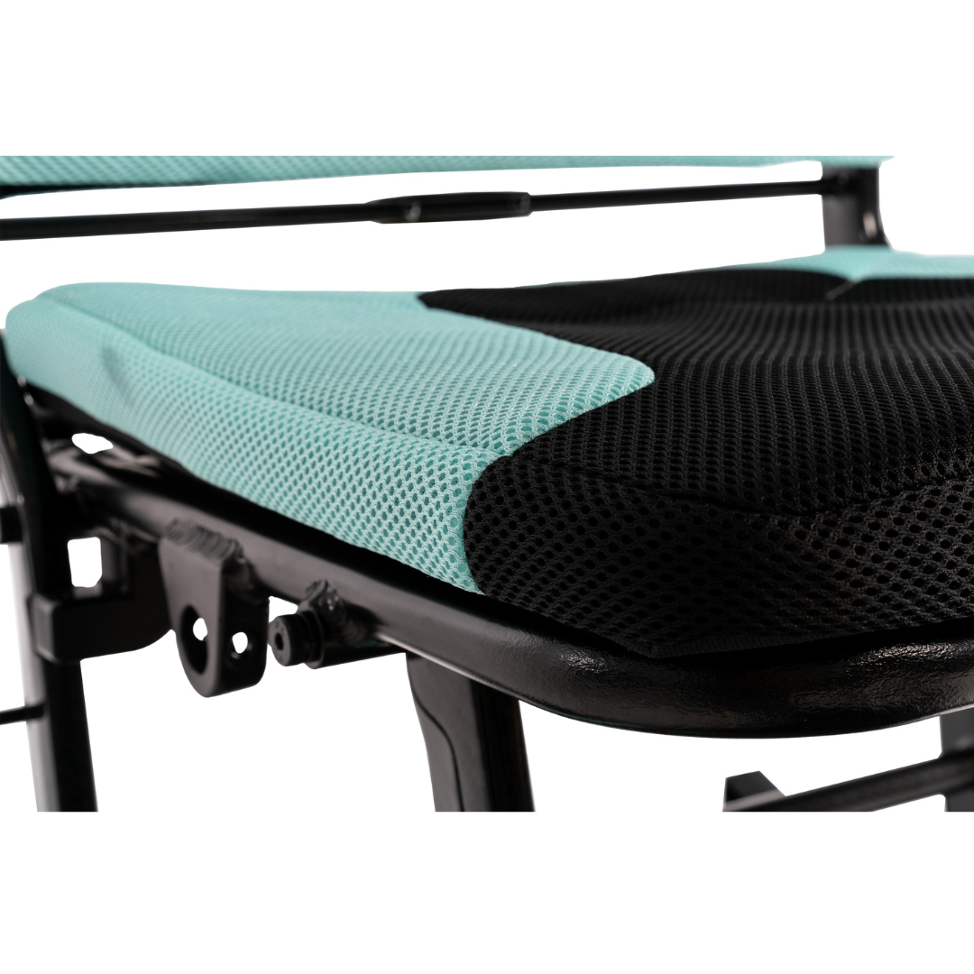 Close-up of a black and green mesh office chair seat, showcasing color contrast and cushioning. Its as reliable as the Pride Mobility Go Go® Super Portable Mobility Scooter with its sturdy metal frame, similar to an airline-approved batterys dependability in a lightweight scooter.