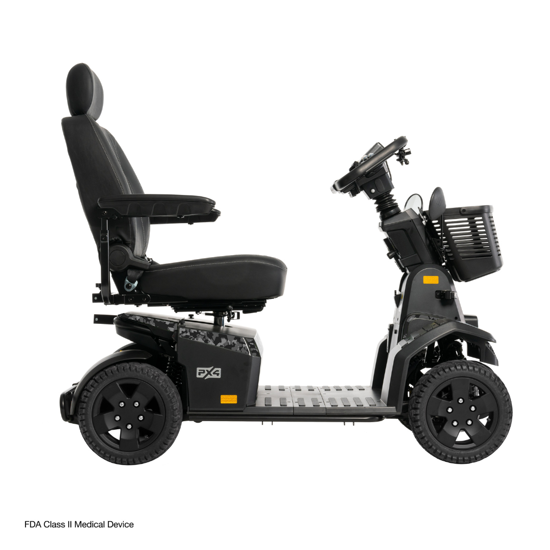 The Pride Mobility PX4 HD Bariatric Scooter is a black, four-wheeled scooter featuring a cushioned seat, backrest, armrests, footrest platform, handlebars with control panel, and front basket—ideal for comfortable long rides with high weight capacity.