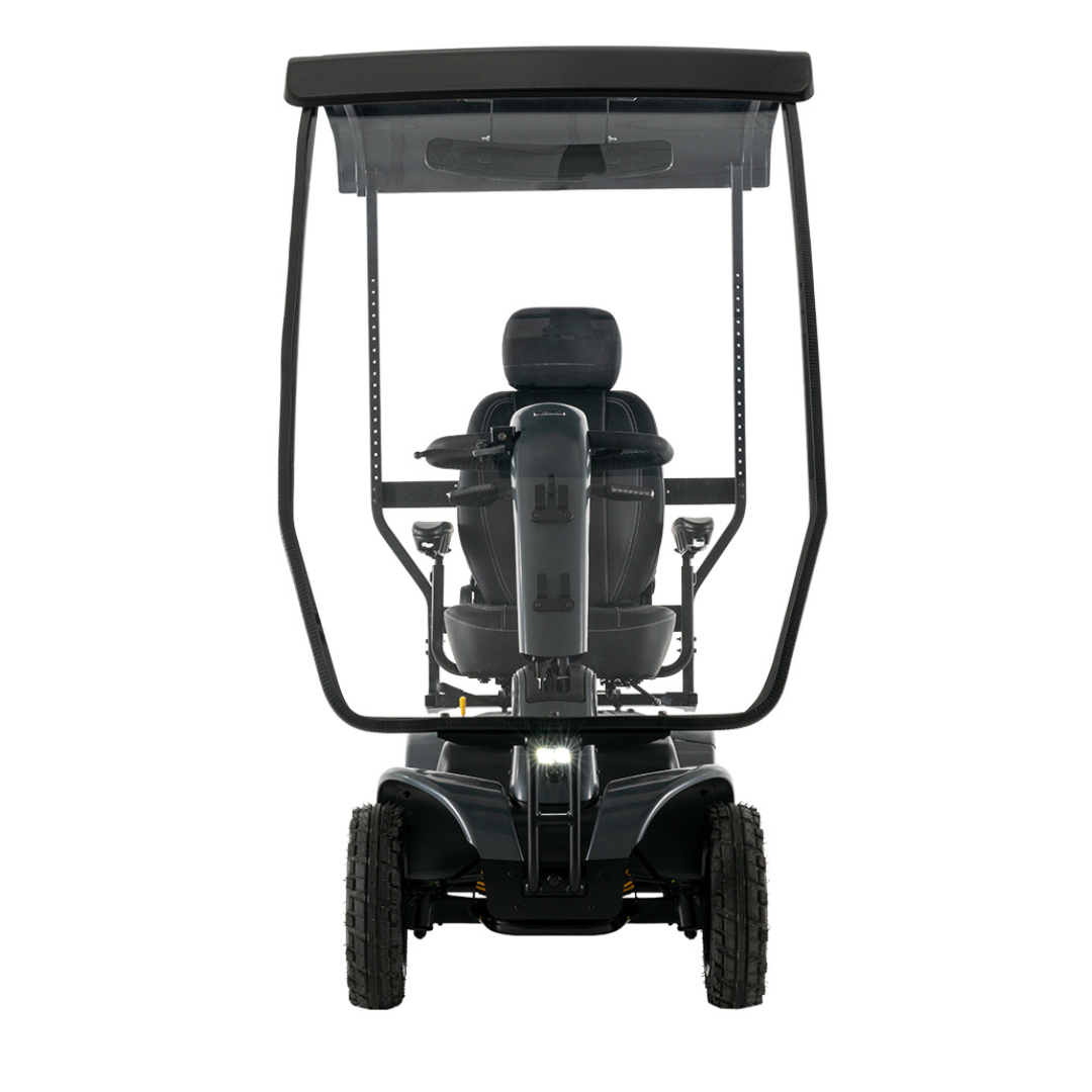 The Pride Mobility Pursuit® 2 Offroad HD Scooter is a black outdoor scooter with a canopy, large wheels, armrests, headrest, and clear windshield—designed for durable, lightweight comfort and optimal mobility outdoors.