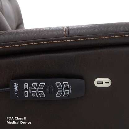 A close-up of a brown leather Pride VivaLift!® Elegance 2 Recliner with Lift Assist armrest features a VitaLift remote, USB charging port, and visible stitching. Text: FDA Class II Medical Device—designed for luxurious relaxation.