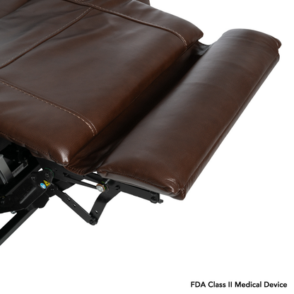 A close-up of a brown leather Pride VivaLift! Premier Recliner With Assisted Lift, Audio & Massage with an extended footrest reveals the metal support mechanism. "FDA Class II Medical Device" appears in the bottom right corner.