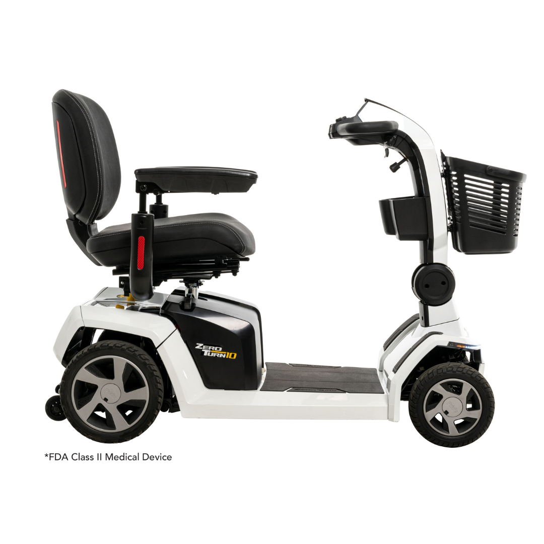 The Pride Mobility Zero Turn 10 HD Scooter, a white midsize four-wheel model with a black seat, armrests, and front basket, is shown from the side. FDA Class II Medical Device. Features EZ Turn Technology for enhanced maneuverability.