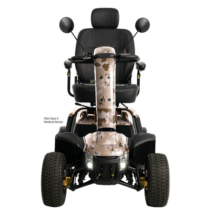 Front view of the Pride Baja® Wrangler® 2 Heavy Duty Outdoor Scooter in camouflage, with large rugged tires, black seat with armrests and headrest, mirrors, headlights, and advanced safety features. FDA Class II Medical Device label shown.