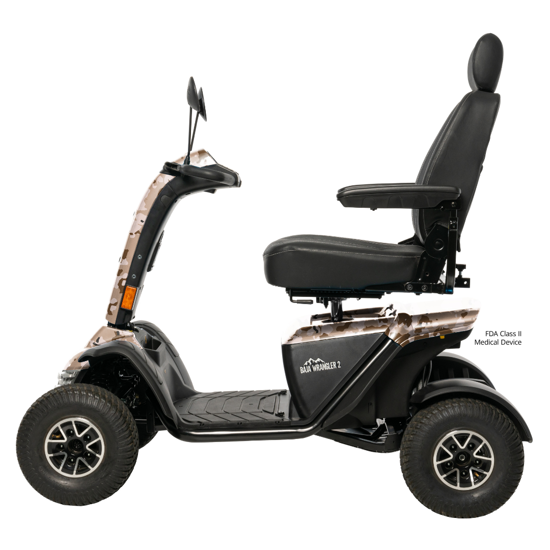 A side view of the Pride Baja® Wrangler® 2 Heavy Duty Outdoor Scooter, a black four-wheeled all-terrain scooter with a large padded seat, armrests, rugged tires, light camo accents, and advanced safety features.